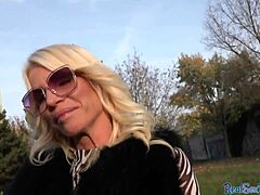 Mature blonde with big boobs and ass gets banged in doggystyle for cash